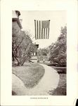 School Entrance with American flag by Unknown