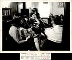 James Slattery and Others Seated in a Room, Student Candids ca. 1967